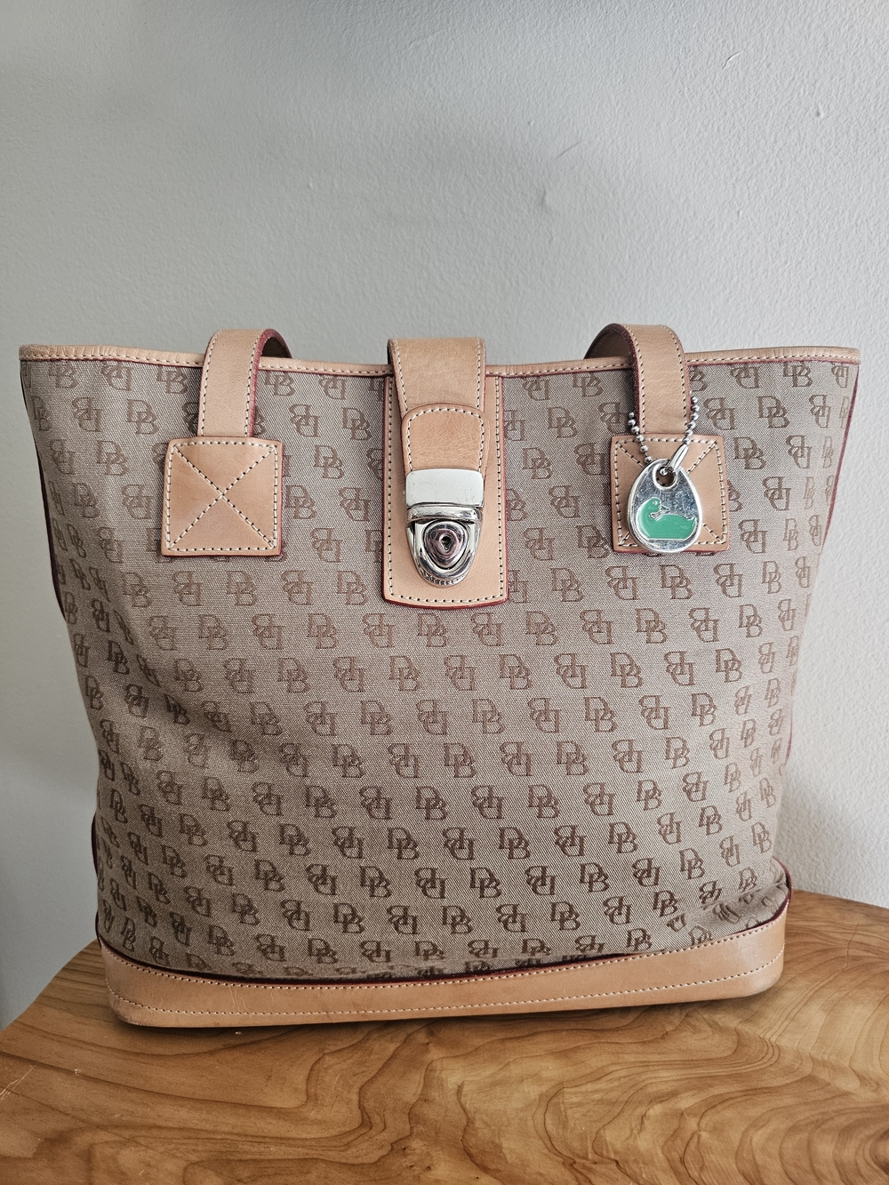 Dooney & Bourke Tan Monogram Tote with Leather Trim and Silver-Tone Lock,callout - Picture 2 of 8